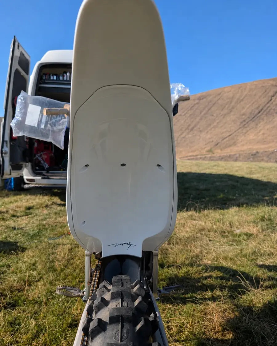 Clean white motocross rear mudguard after cleaning